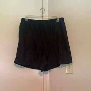 Men’s bcg shorts with built in mesh underwear. XL.